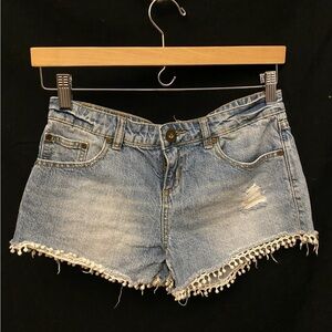 O’Neil girls jean shorts with Pom Pom fringe bottom